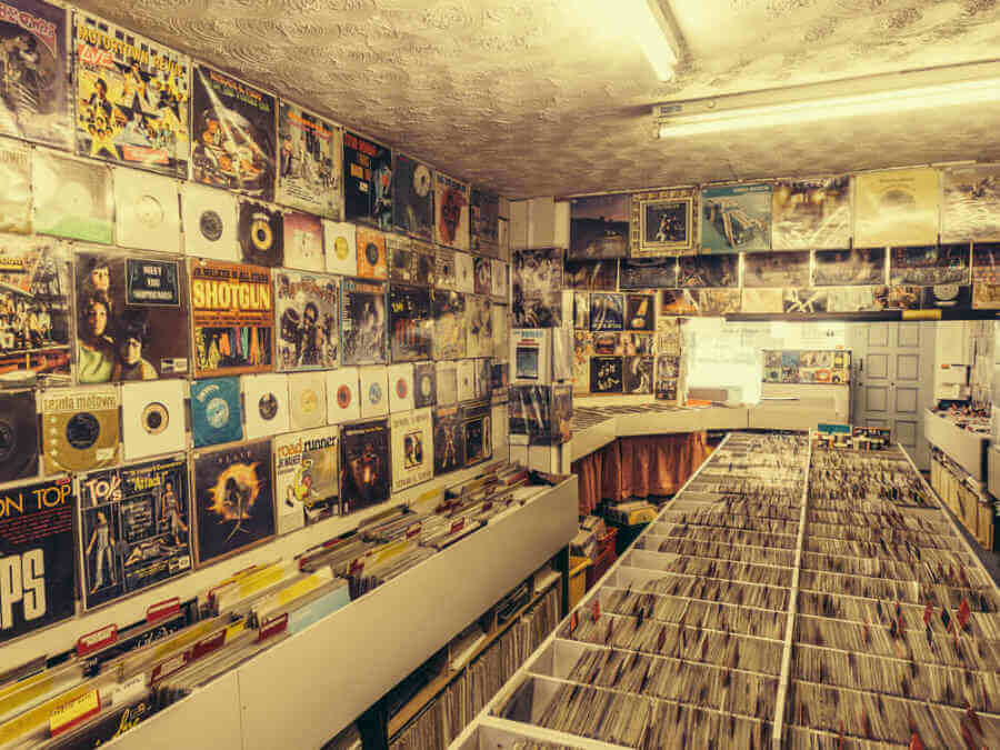 record collection on shelves and How to Pack Records for Moving