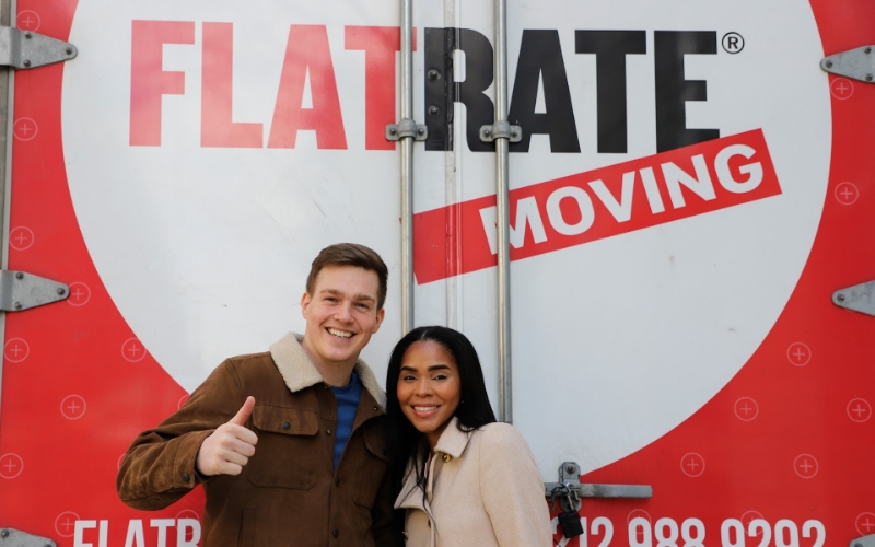 A couple saying Moving households is easy with FlatRate