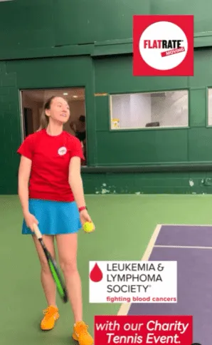 Racquet player wearing FlatRate Moving shirt for charity fundraiser
