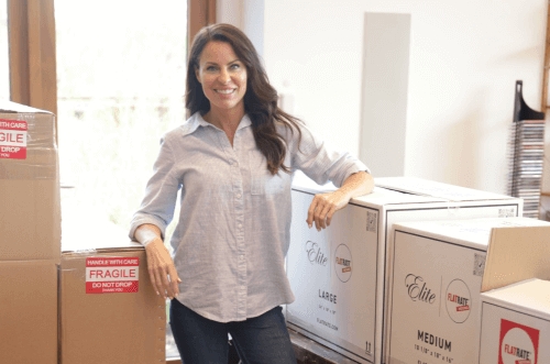 Woman stand between boxes